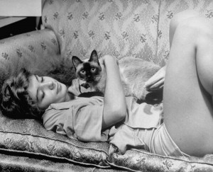 Woman Cuddling Cat by Alfred Eisenstaedt